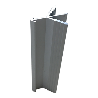 close up of the arrowhead corner protector extrusion, used for protecting mill work edges and protecting people from scratching themselves